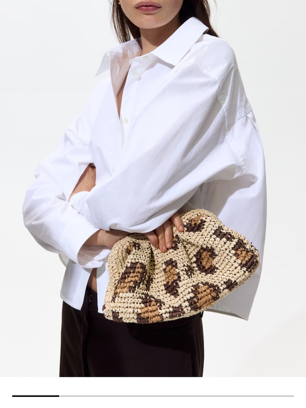 Leopard straw clutch